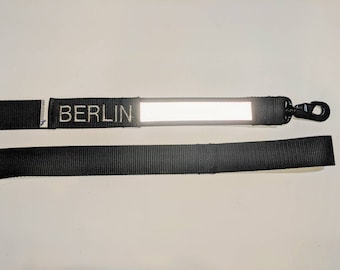 Reflective swivel bolt leash with military webbing and name Tag. Made in the USA