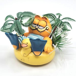 Vintage PVC Collectible Figurine, Garfield on Yellow Duck Pool Float