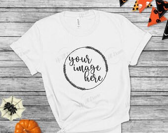 May include: White t-shirt with a black circle design that says "your image here" in a cursive font.