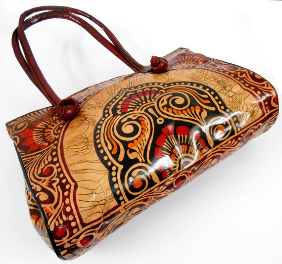 Rust-Orange Pure Leather Big Shoulder Radha Krishna Bag from Shantiniketan  Kolkata, Hand-Carved and Hand-Painted with Non-Toxic Vegetable Dyes |  Exotic India Art