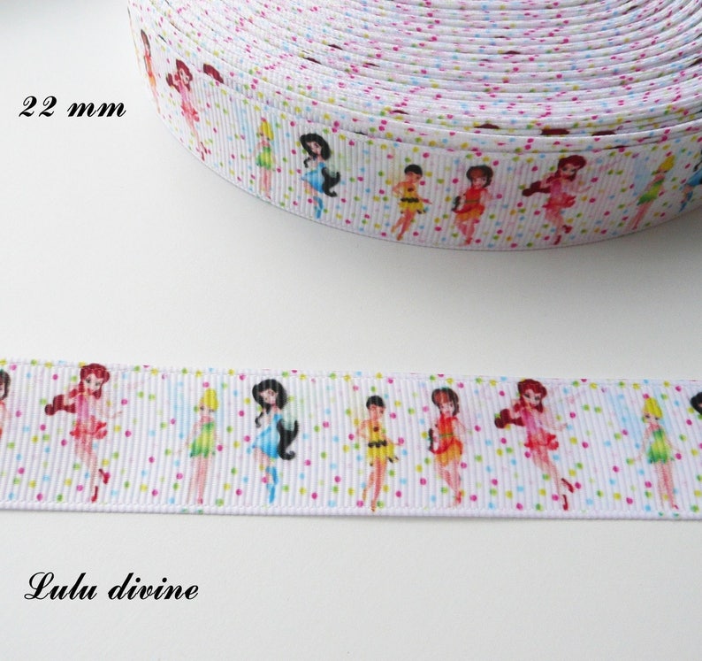 Ribbon large white grain with multicolored polka dots The fairy Ribbon large white grain with multicolored polka dots The fairy