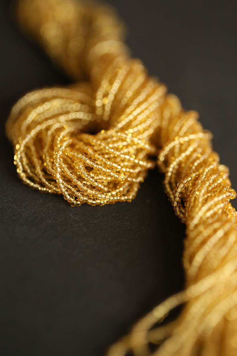 luneville embroidery Tiny wick old rockeries strukes strut strukes strut size 16 golden antique rounds high-couture beads strung beads