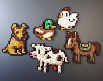 Various Stardew Valley fuse bead art/fridge magnets