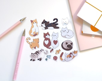 May include: A sheet of stickers featuring various illustrations of cats in different poses. The stickers are white with black outlines and feature a variety of colours, including brown, orange, white, and grey. The stickers are perfect for adding a touch of whimsy to laptops, water bottles, journals, and more.
