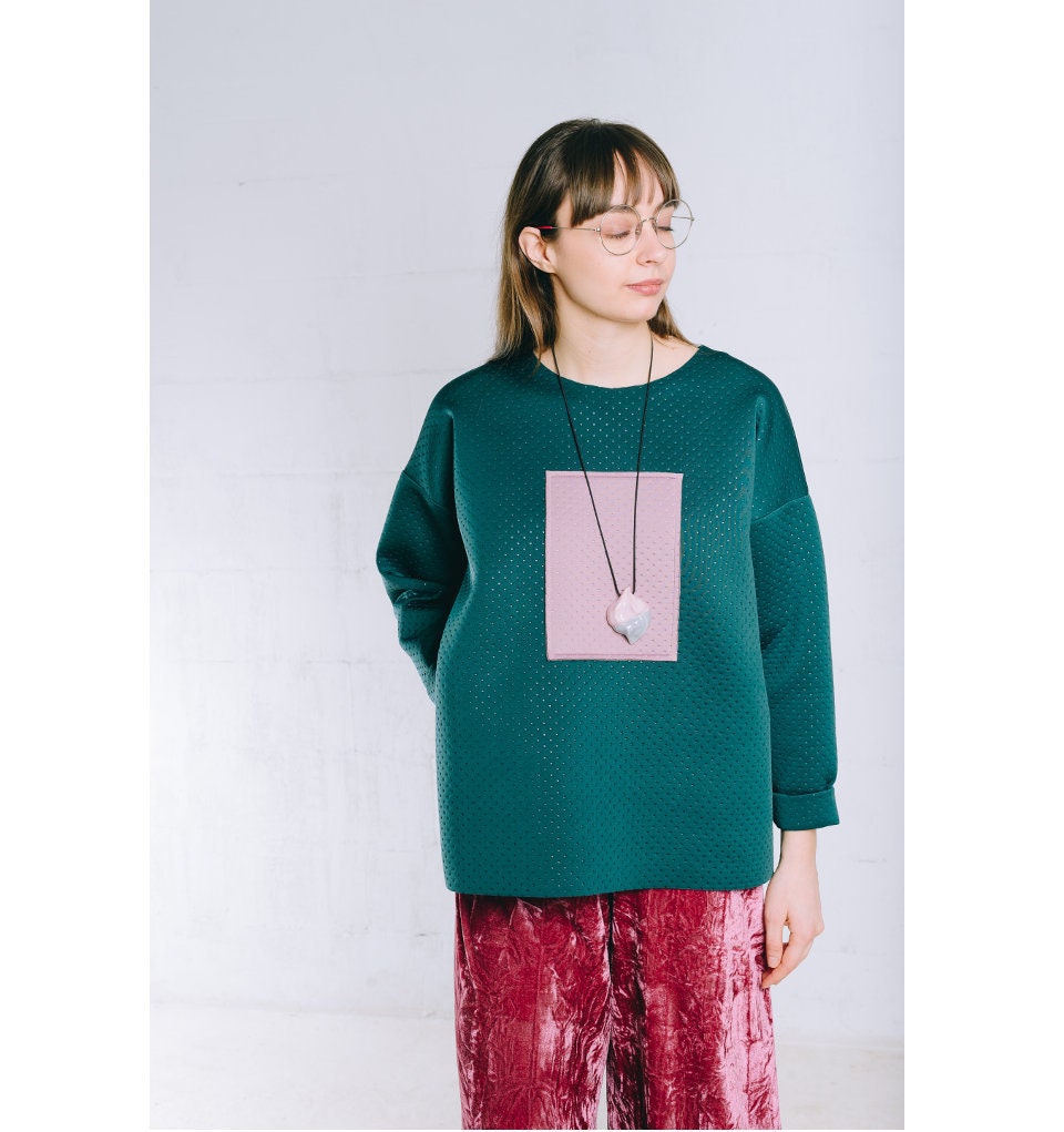 emerald green sweatshirt