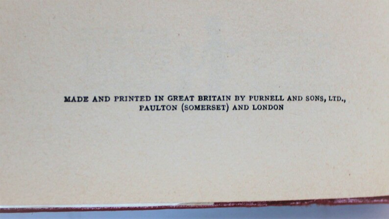 May include: A book with the text "MADE AND PRINTED IN GREAT BRITAIN BY PURNELL AND SONS, LTD., PAULTON (SOMERSET) AND LONDON" printed on the back cover.