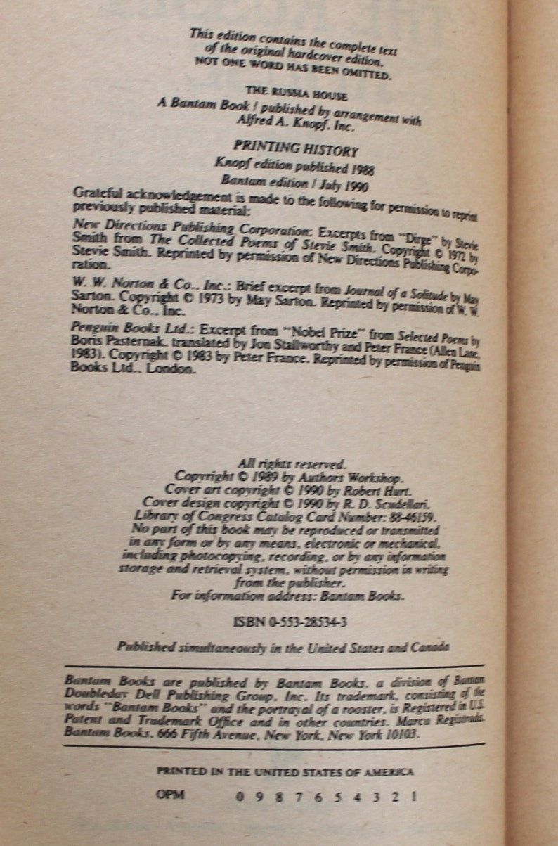 May include: A book cover with a white background and black text. The title of the book is "The Russia House" and the author is John le Carre. The book is published by Bantam Books and is a paperback edition.