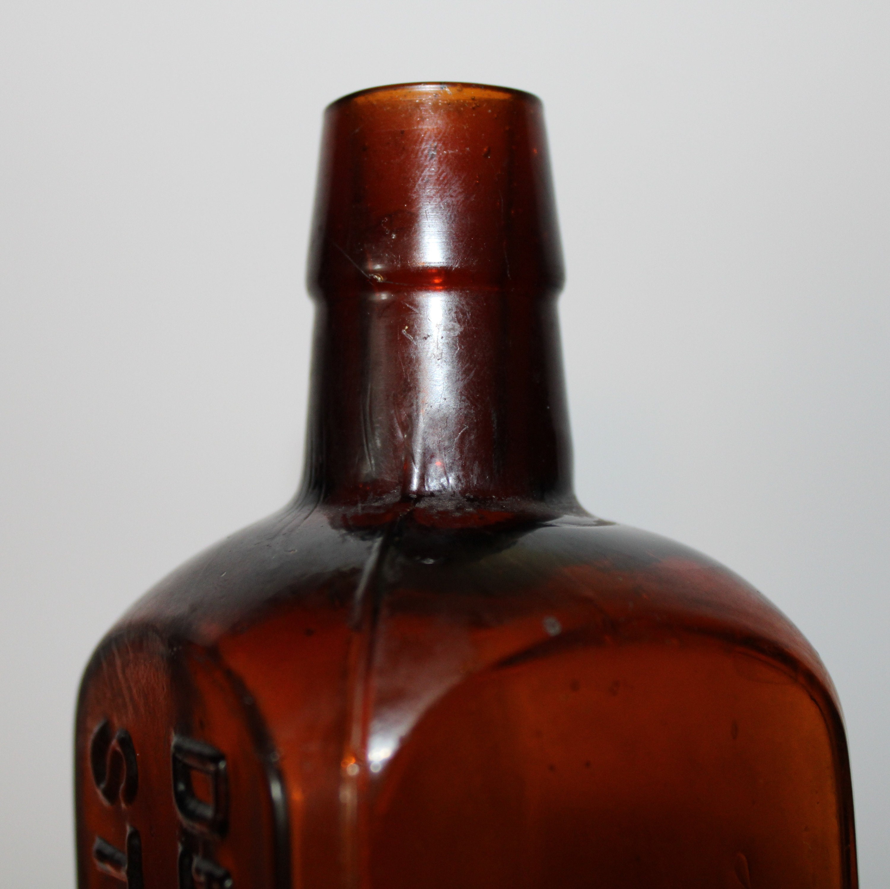 all original antique dug c. 1880's-1890's deep amber glass medicine bottle  manufactured for preston b. rose in chicago, il.