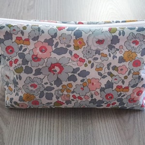 Kit has a makeup, liberty betsy porcelain, floral pouch