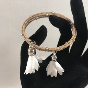 Tan matte bead memory wire wrap bracelet White satiny flowers image 1