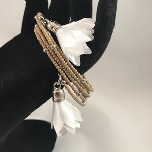 Tan matte bead memory wire wrap bracelet White satiny flowers image 2