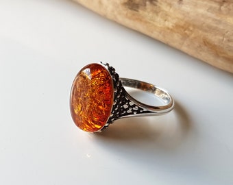 Natural Glossy Cognac color Genuine Baltic Amber ring 6.3 grams.