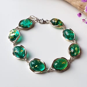 Armband i blått baltiskt bärnsten, Armband i bärnsten och sterlingsilver, Armband i natursten, Armband i blått ädelsten