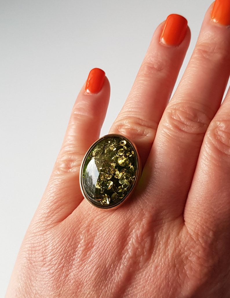 Gold-plated ring with shiny green Baltic amber, Statement amber ring, Vibrant green amber ring, Green Baltic amber jewelry with glitters image 6