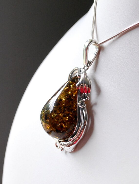 Natural Green Amber Drop Sterling Silver Pendants Natural Green Amber Drop Sterling Silver Pendants