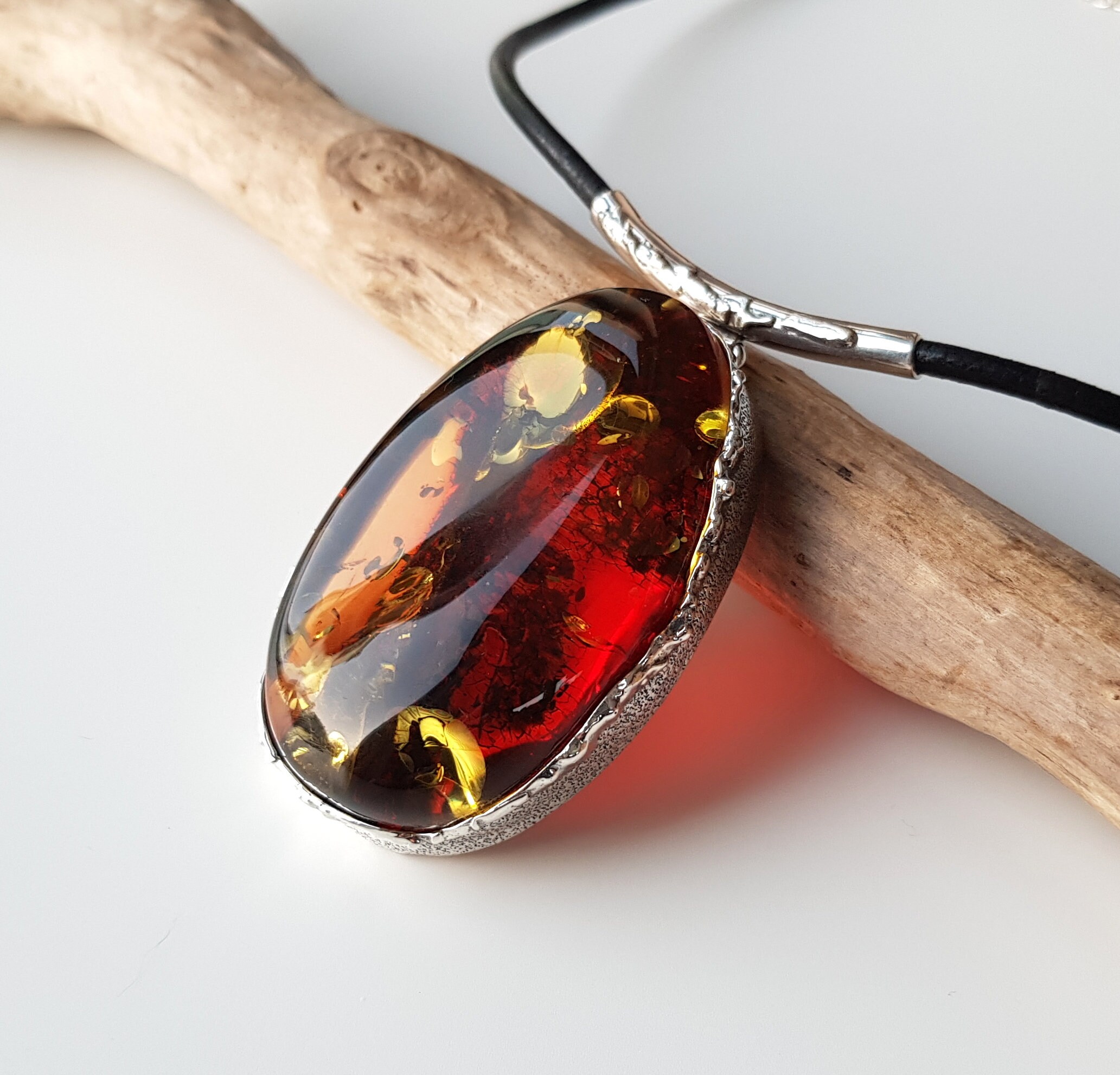 thumbnail interactive-video image 1 of Natural Lithuanian Cognac Baltic Amber 24" Necklace + Charged With Selenite 1 of 6