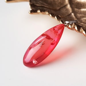 Pink amber gemstone deals