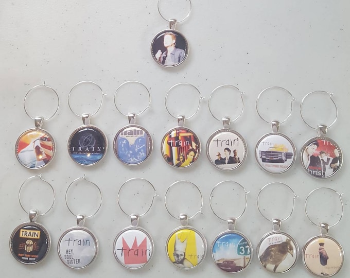 The band Train wine charms set of 4, you choose. Pat Monahan, music, Drops of Jupitor, Soul Sister...