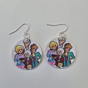Golden Girls dangle faux leather earrings.