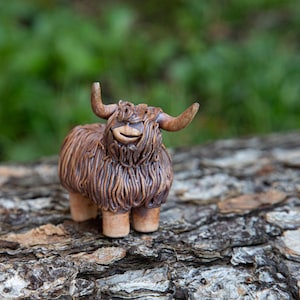 Small pottery highland cow