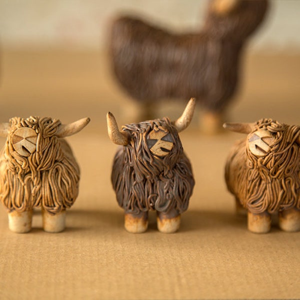 Small pottery highland cow