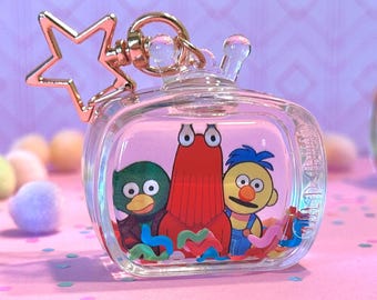 Don't Hug Me I'm Scared DHMIS Liquid Shaker TV Schlüsselbund - Acrylanhänger 4,4 cm.