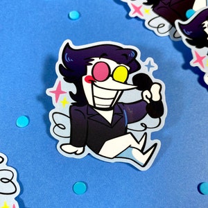 May include: A cartoon character with black hair, a black suit, and a white shirt is holding a black phone. The character has pink and yellow eyes and a wide smile. The background is blue with white stars.