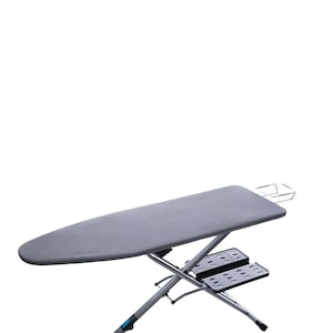 May include: A gray ironing board with a metal frame and a footrest. The board has a metal rack on the side for storing items.