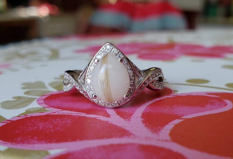 Sterling Silver Teardrop Infinity Breastmilk Ring with simulated diamonds
