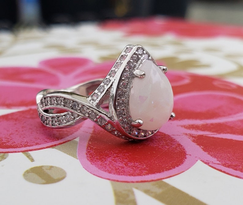 Sterling Silver Teardrop Infinity Breastmilk Ring with simulated diamonds