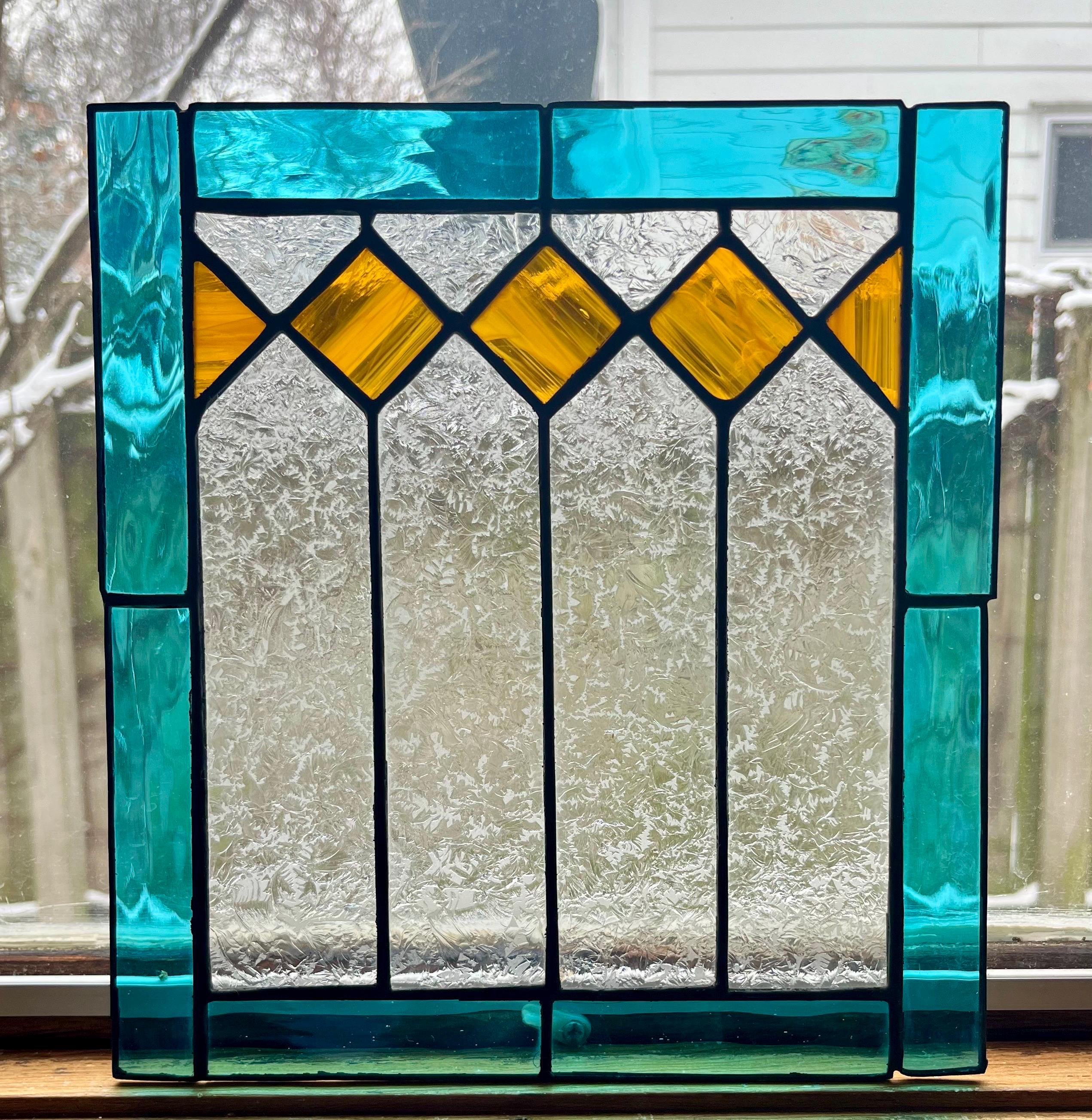 Stained Glass Window Hanging With Amber Diamonds Surrounded by an Aqua ...