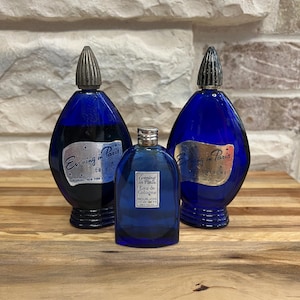 Evening in Paris Cologne Bourjois ~ Includes Three Bottles ~ One bottle is almost full, one has a small amount and one bottle is empty.