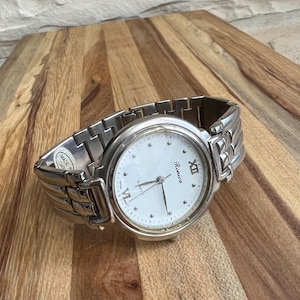 Ronica Quartz Wristwatch: Stainless Steel Band, White Dial, Japan Movement