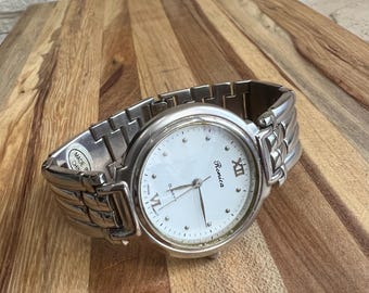 Ronica Quartz Wristwatch: Stainless Steel Band, White Dial, Japan Movement