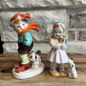 Vintage Ceramic Figurines: Mid-Century Boy and Girl with Dogs