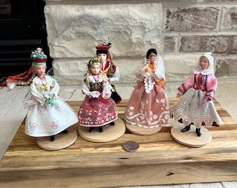 Vintage Polish Folk Art Dolls: Traditional Costume Dolls on Wooden Platform