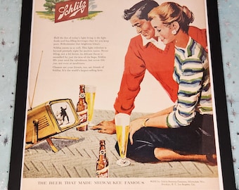Stampa pubblicitaria vintage autentica della birra Schlitz del 1956, incorniciata.