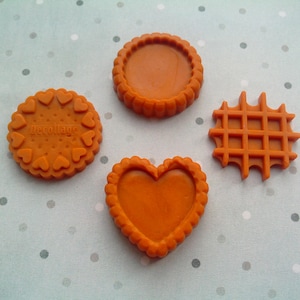 Silicone molds in the form of Miniature cookies of different shapes. Molds for polymer clay