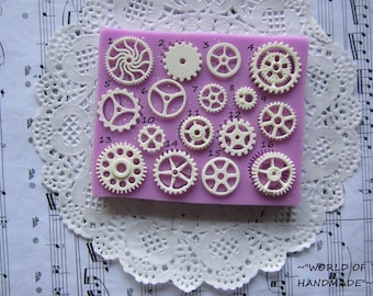Silicone molds in the form of gears of different shapes and sizes. Molds for polymer clay and plastics.