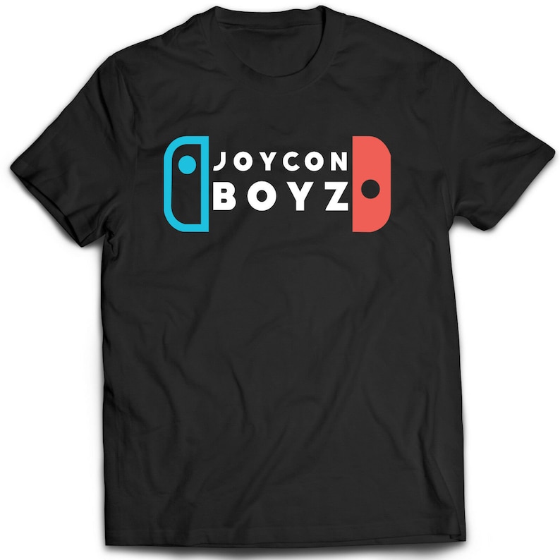 May include: Black t-shirt with a white graphic of a Nintendo Switch Joy-Con controller with the text "JOYCON BOYZ" in white.