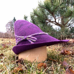 May include: A set of three ceramic mugs with a speckled, matte finish. The mugs are in shades of cream, light gray, and dark gray. Each mug has a simple, minimalist design, perfect for coffee or tea.