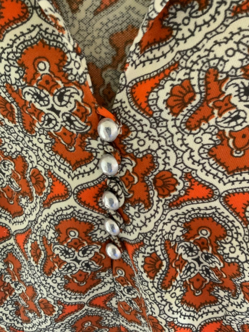 Orange Paisley Shirt With Silver Buttons. Very jan From the Brady Bunch