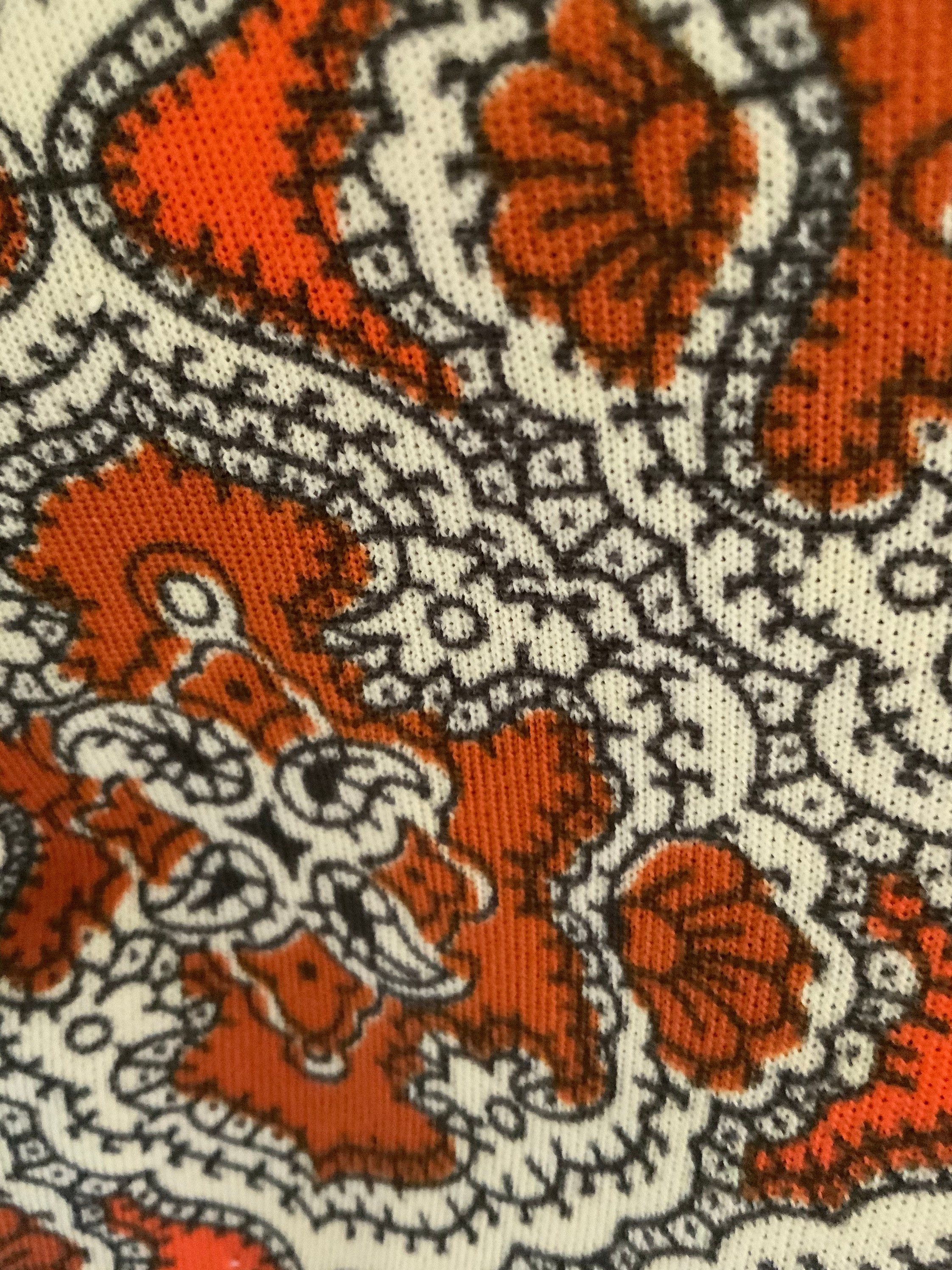 Orange Paisley Shirt With Silver Buttons. Very jan From the Brady Bunch