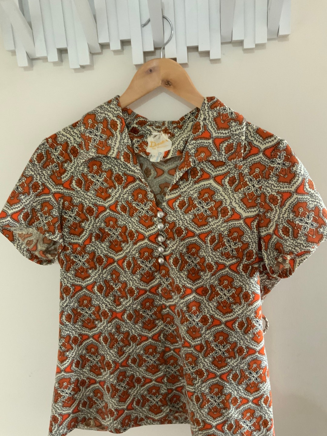 Orange Paisley Shirt With Silver Buttons. Very jan From the Brady Bunch. 1960s or 1970s