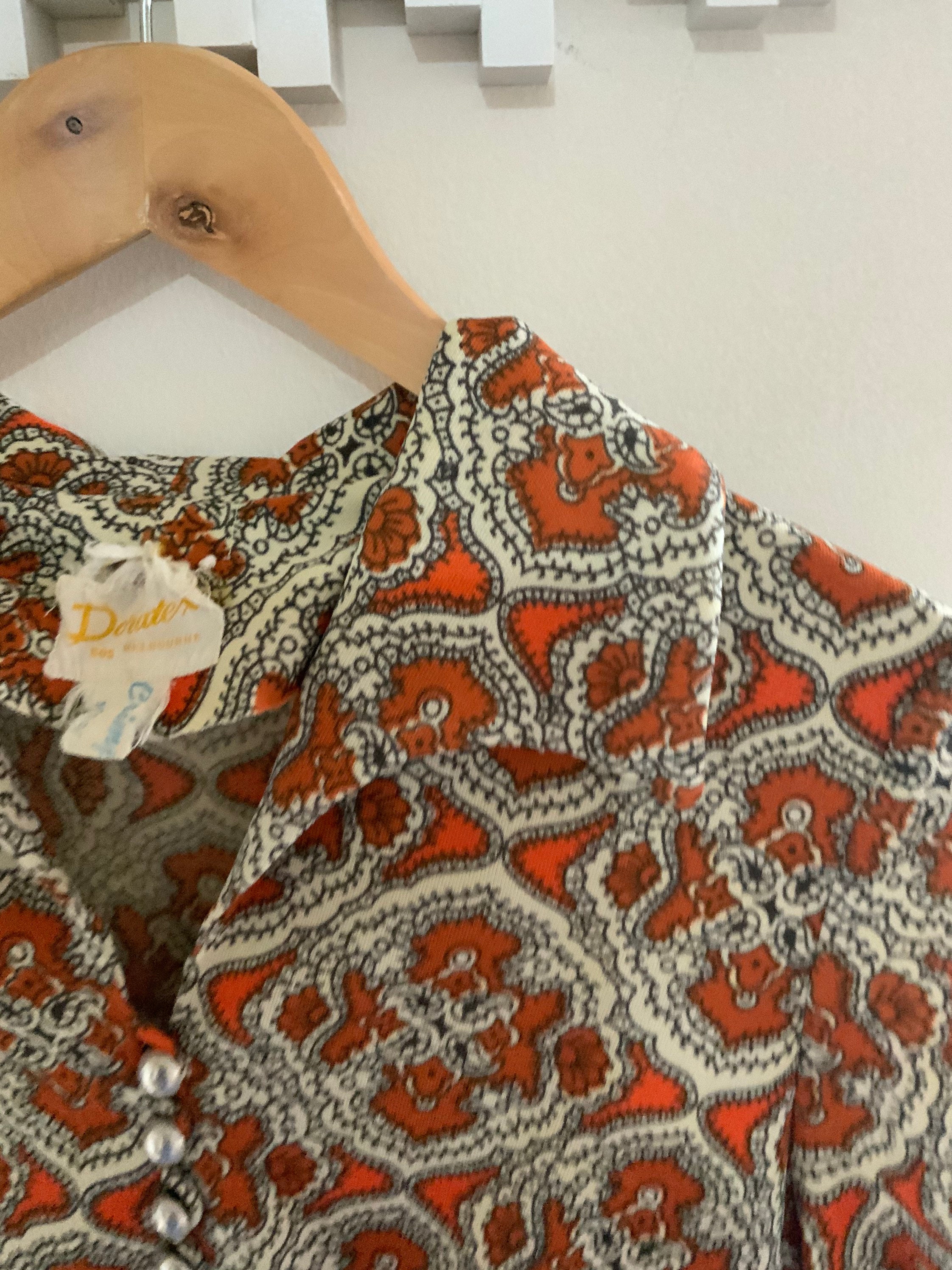 Orange Paisley Shirt With Silver Buttons. Very jan From the Brady Bunch