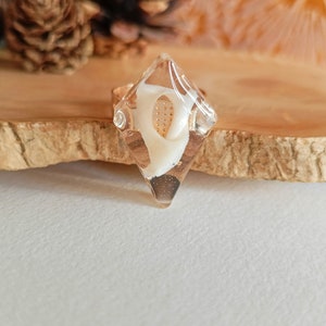 Resin and shell adjustable ring