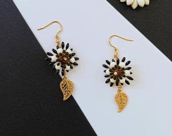 Metal flower dangling earrings for women