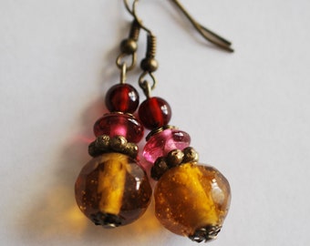 Boucles d'oreille Bohème aux couleurs ambre ,grenat et bronze.