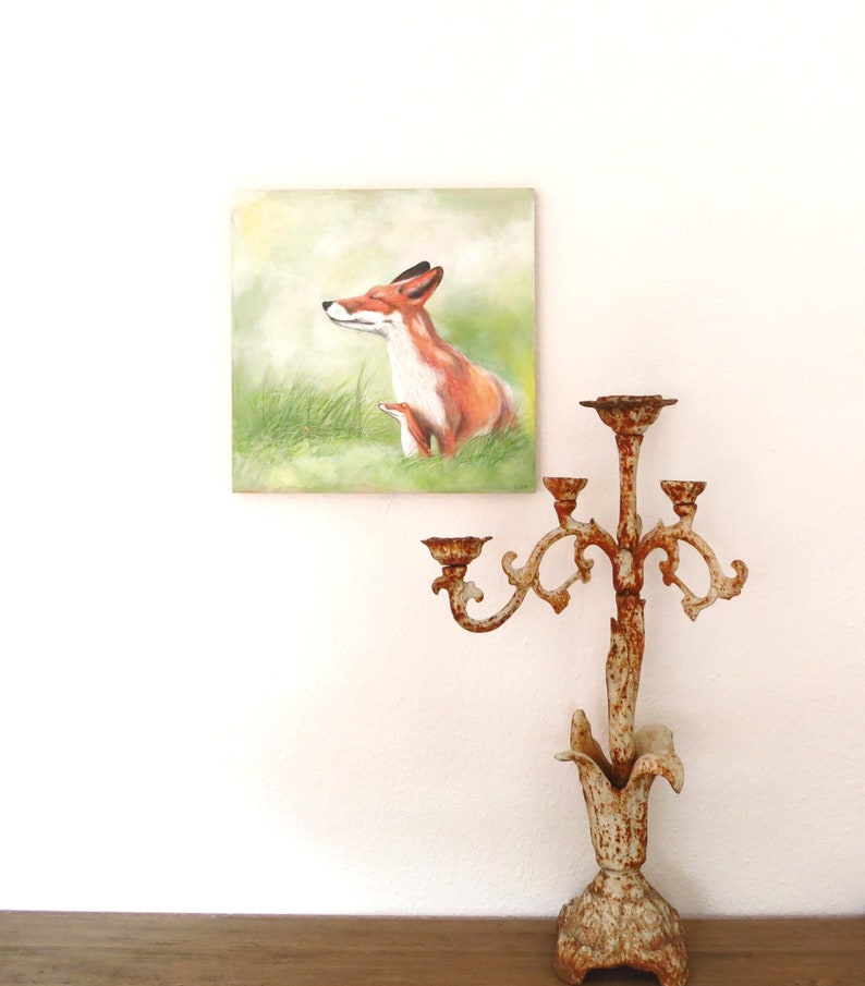 May include: A painting of a red fox with its eyes closed, sitting in a grassy field. The fox is painted in a realistic style with soft, muted colors.