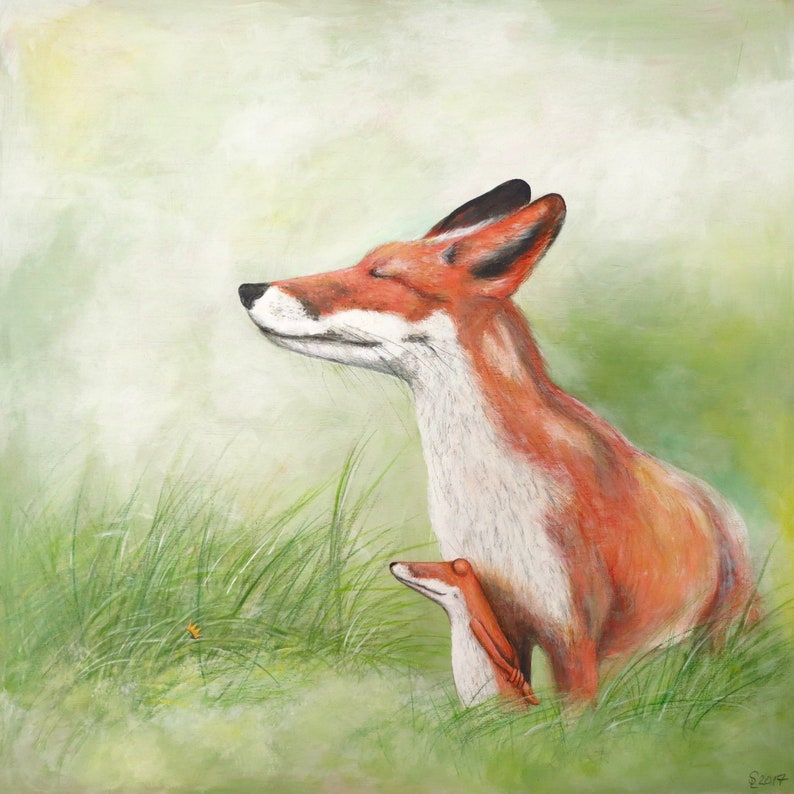 May include: A red fox with a white chest and a closed mouth is standing in a field of green grass. The fox is looking up and has its eyes closed. A smaller fox is nestled against the larger fox's side.